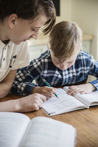 Brothers doing homework