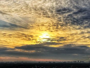 Low angle view of dramatic sky during sunset