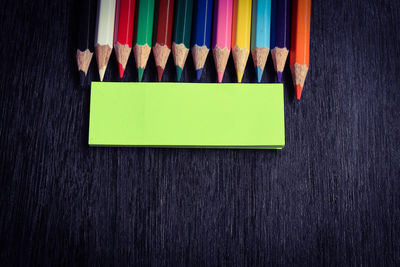 Directly above shot of multi colored pencils on table