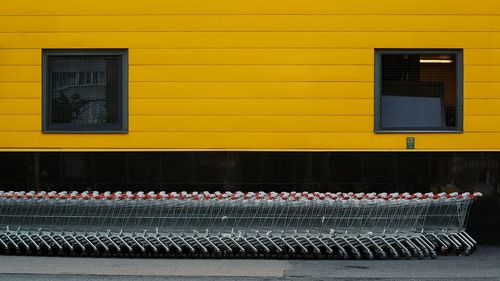 Row of shopping carts outside store