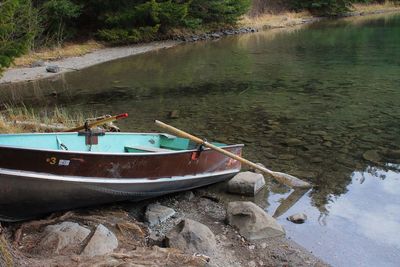 High angle view of boat moored on lake