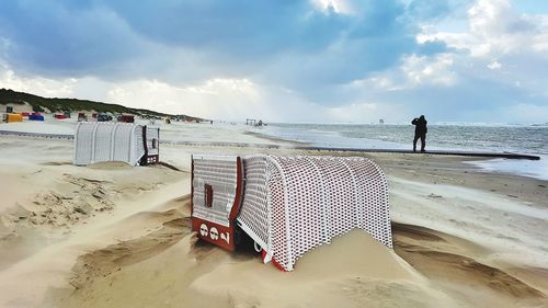 Scenic view of beach against sky