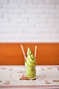 Close-up of juice served on table