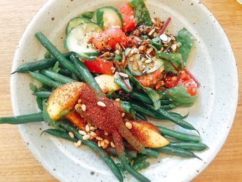 Directly above shot of salad served in plate on table