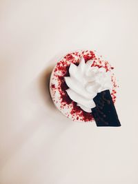 Directly above shot of cake on white background