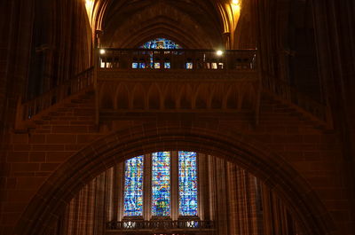 Low angle view of illuminated window in building