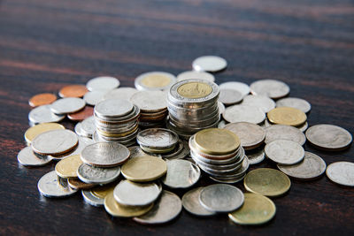 High angle view of coins on table