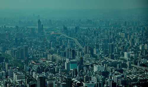 High angle view of modern buildings in city