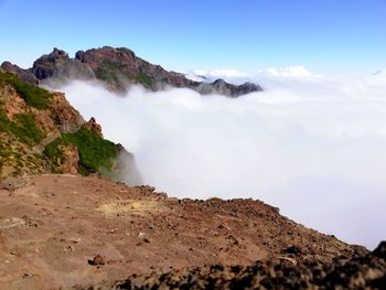 Scenic view of volcanic mountain against sky