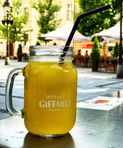 Close-up of drink in glass jar on table