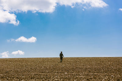 Woman walking on field