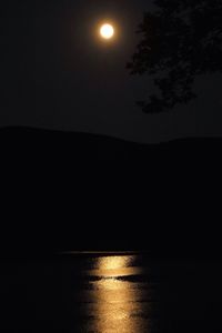 Scenic view of landscape against sky at night
