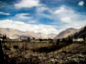 View of landscape against cloudy sky