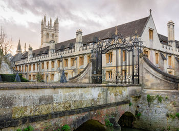 View of old building against cloudy sky