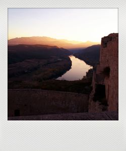 View of landscape against sky during sunset