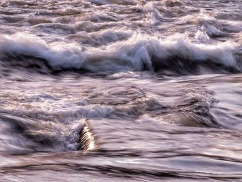 Full frame shot of water flowing in sea