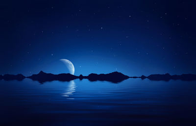 Scenic view of sea against sky at night