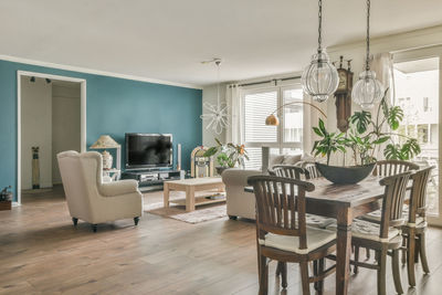 Empty chairs and tables and table and chair on floor at home