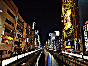 Illuminated buildings in city at night