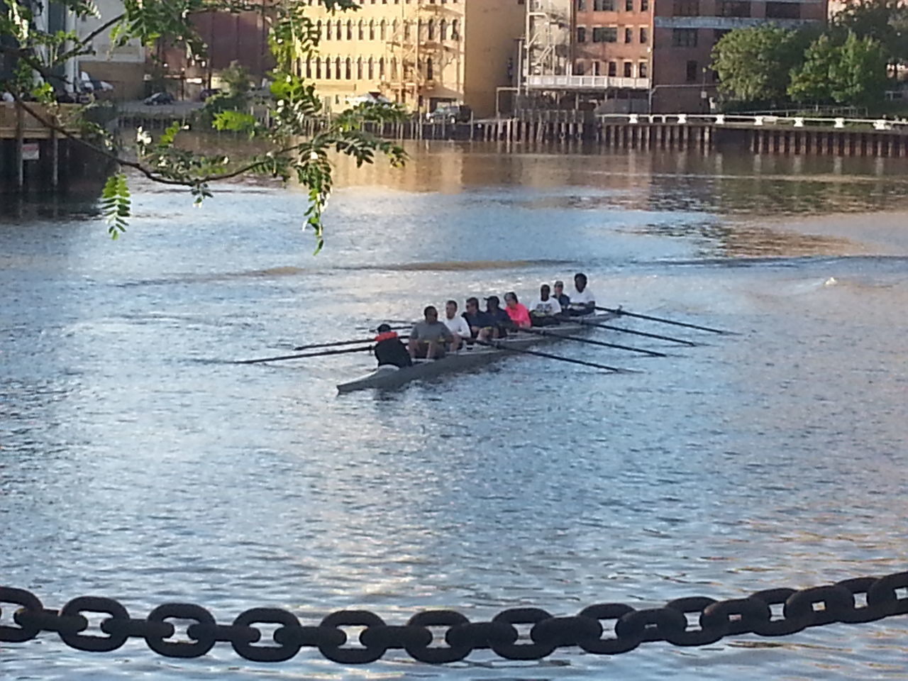 water, men, large group of people, nautical vessel, waterfront, lifestyles, transportation, river, built structure, person, leisure activity, mode of transport, architecture, boat, building exterior, lake, pier, day, mixed age range