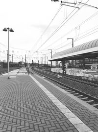 Railroad station platform against sky