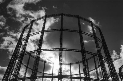 Low angle view of ferris wheel against sky