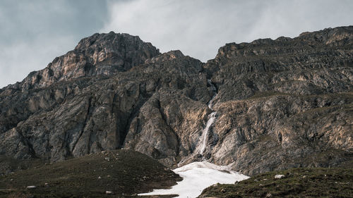 Scenic view of rocky mountains against sky