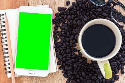 High angle view of coffee cup on table