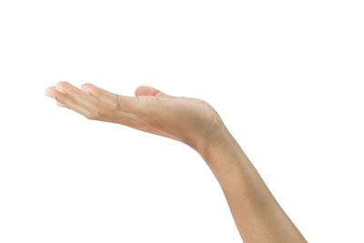 Close-up of hand against white background