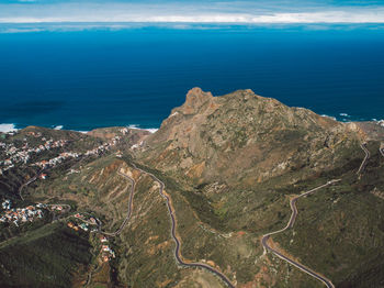 High angle view of sea shore against sky