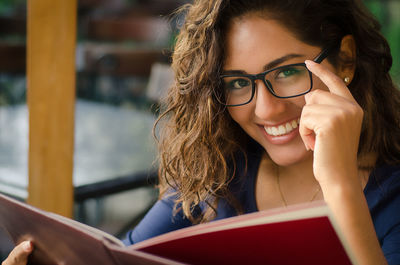 Portrait of smiling young woman