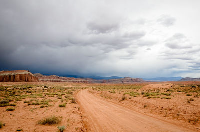 Dirt road passing through a desert