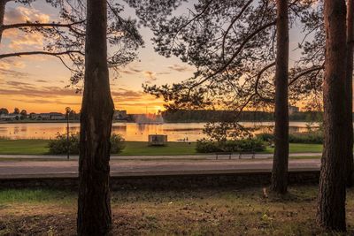 Scenic view of lake against sky during sunset