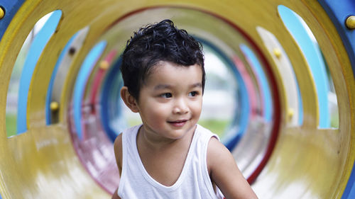 Cute boy playing in playground