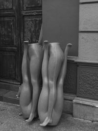 Mannequin legs outdoors in black and white