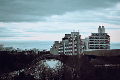 Buildings in city against sky