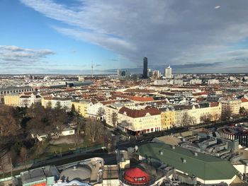 High angle view of city buildings against sky