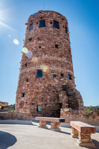 Low angle view of historical building against clear blue sky