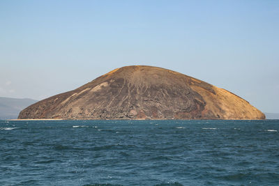 Scenic view of sea against clear sky island of the devil