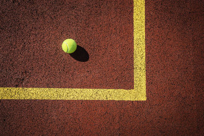 High angle view of tennis ball on field