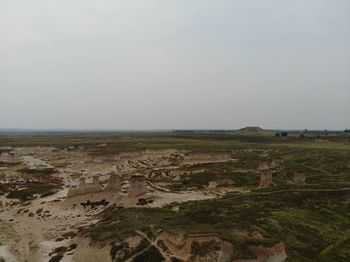 Scenic view of land against clear sky