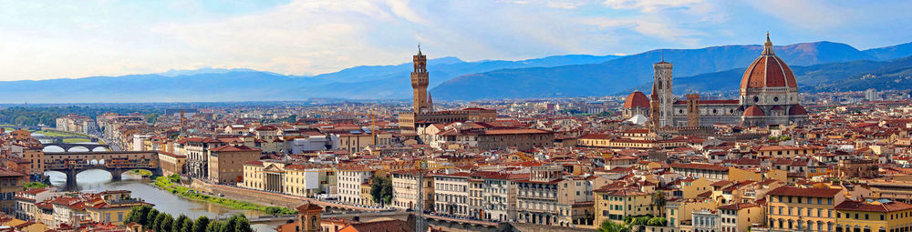 Panoramic view of cityscape against sky