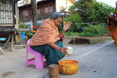 Buddhist make merit in the morning.