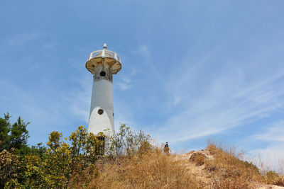 Low angle view of lighthouse against sky