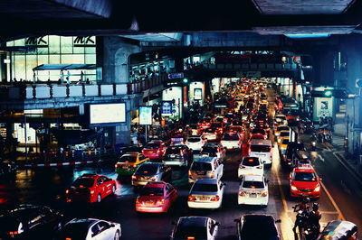 High angle view of traffic on city street at night
