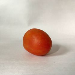 Close-up of apple against white background