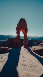 Rock formation against clear sky