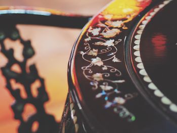 Close-up of camera on table