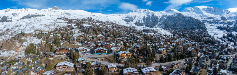 Aerial view of townscape against sky