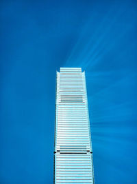 Low angle view of building against blue sky